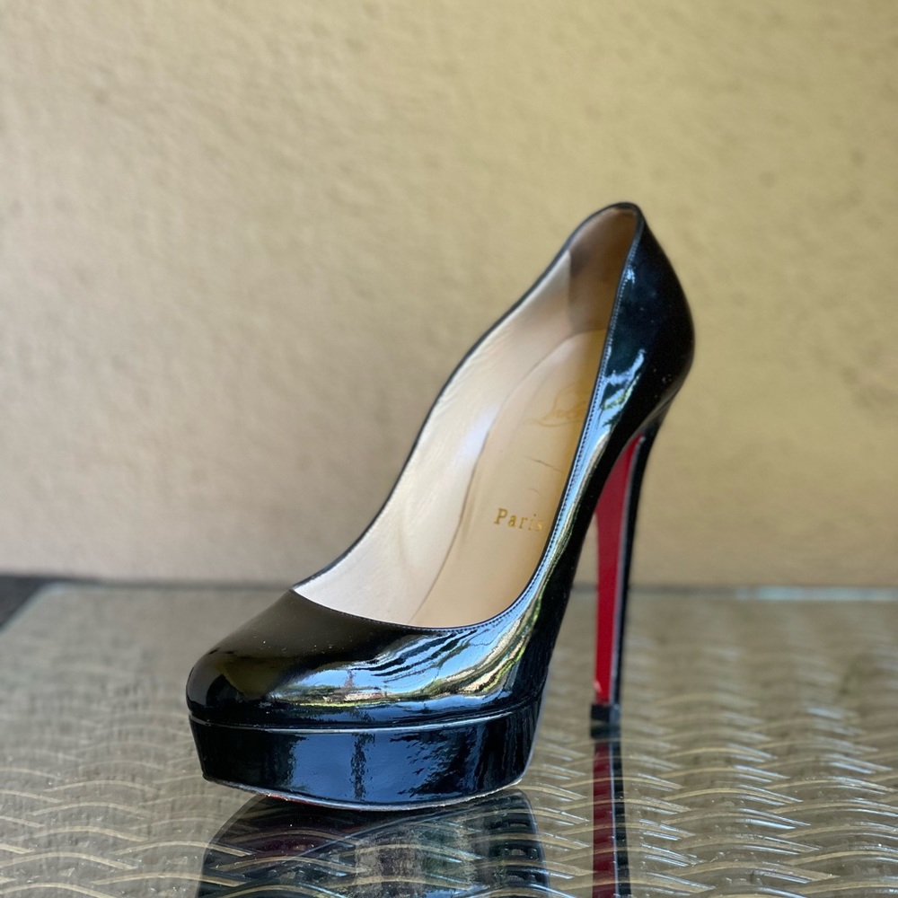 CHRISTIAN LOUBOUTIN patent leather pumps